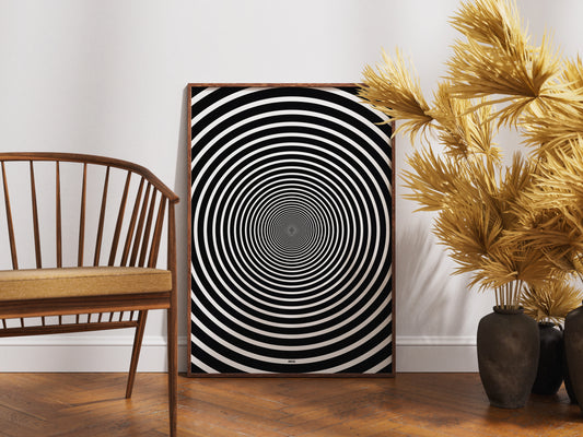 Affiche encadrée abstraite en noir et blanc avec un motif de cercles concentriques pour créer un effet optique hypnotique et captivant vers le centre, par Orcaz Designs.