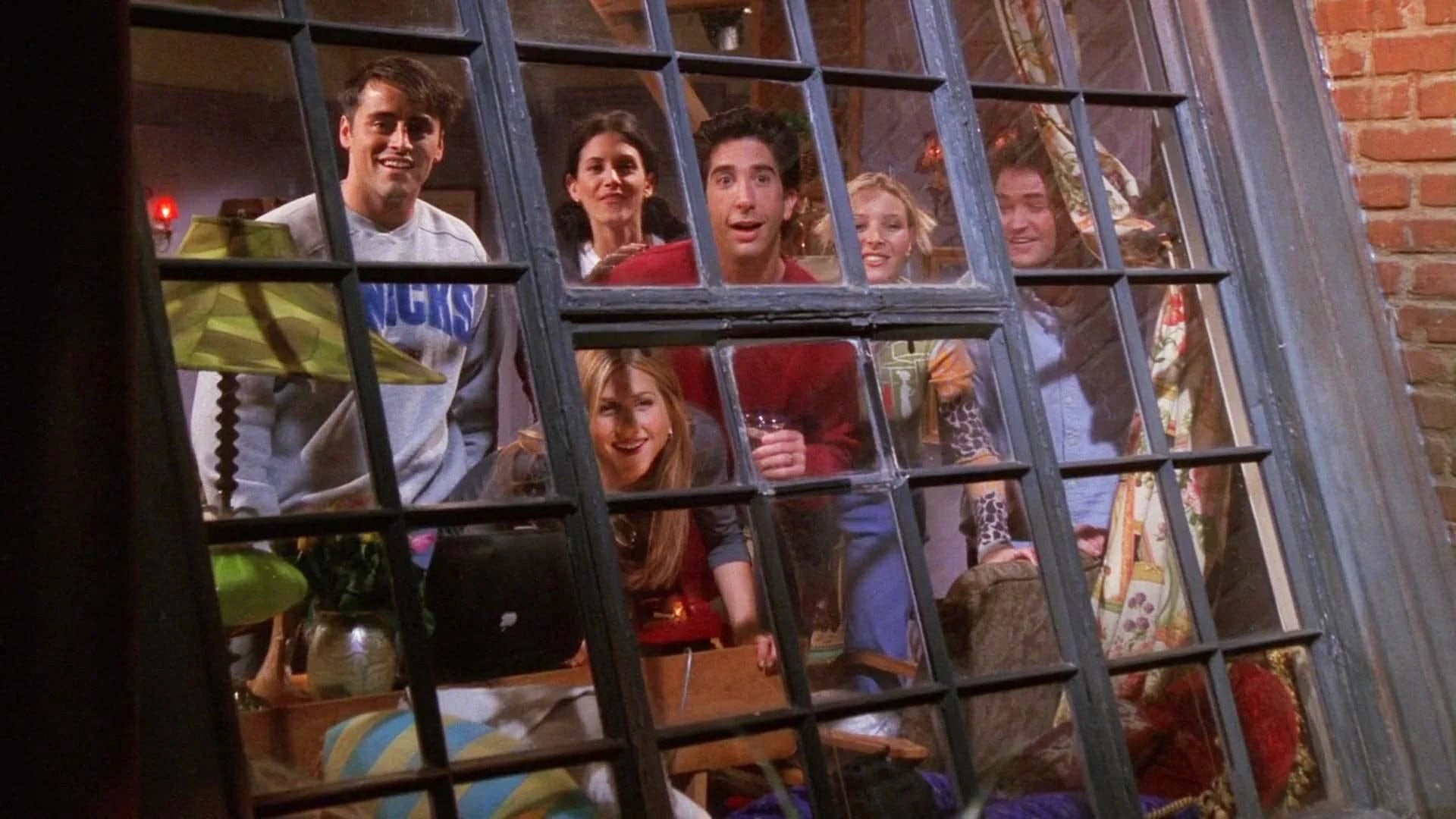 Image des six personnages de la série Friends regardant par la fenêtre.