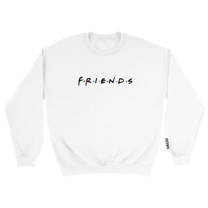 Tshirt blanc de la série Friends avec le logo de la série brodé sur le torse et le logo Orcaz brodé sur la manche au niveau du poignet gauche