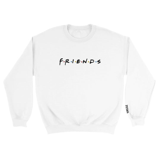 Tshirt blanc de la série Friends avec le logo de la série brodé sur le torse et le logo Orcaz brodé sur la manche au niveau du poignet gauche